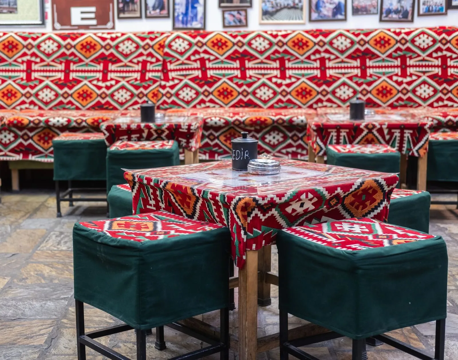 A quiet café scene with cultural decor, symbolizing cross-cultural connection.