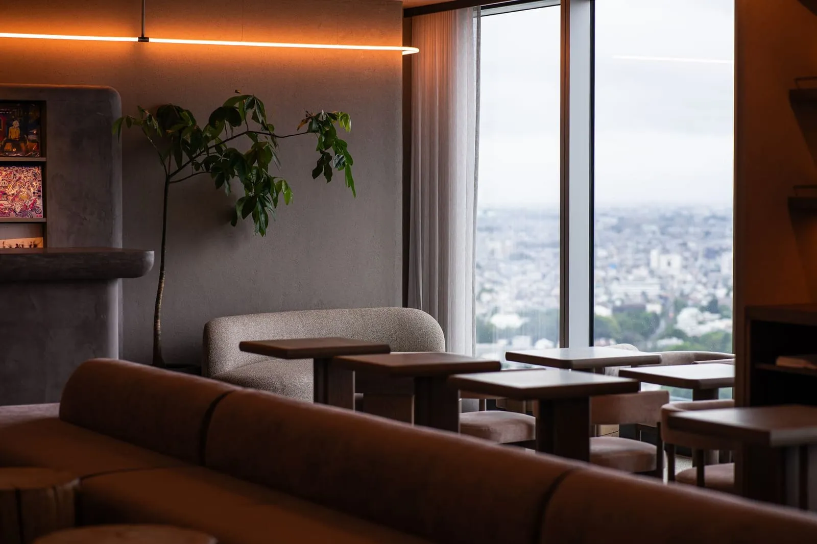 A bustling Tokyo café with diverse conversations filling the air.