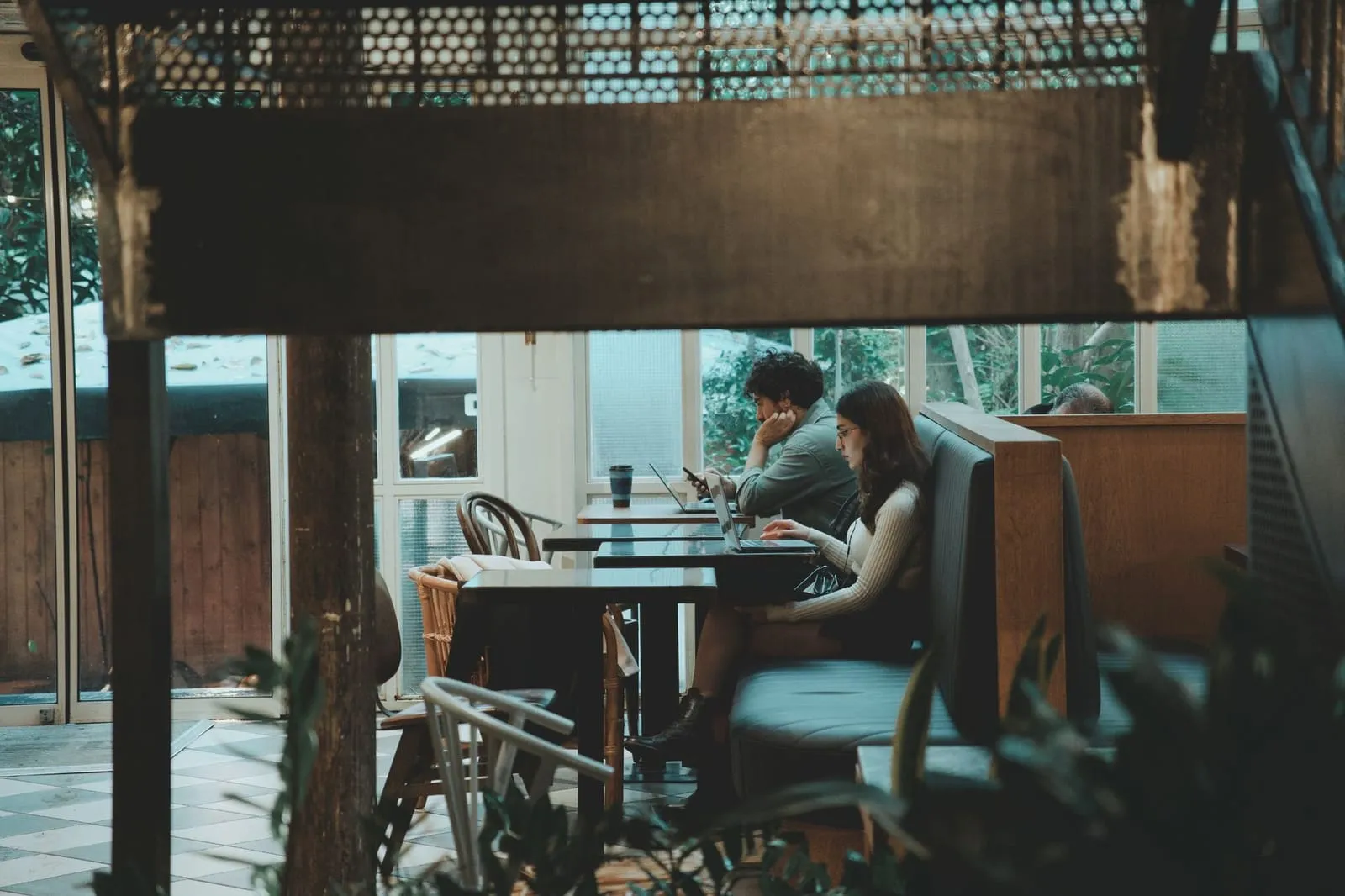 A cozy Asian café interior with a welcoming atmosphere, symbolizing online trust.