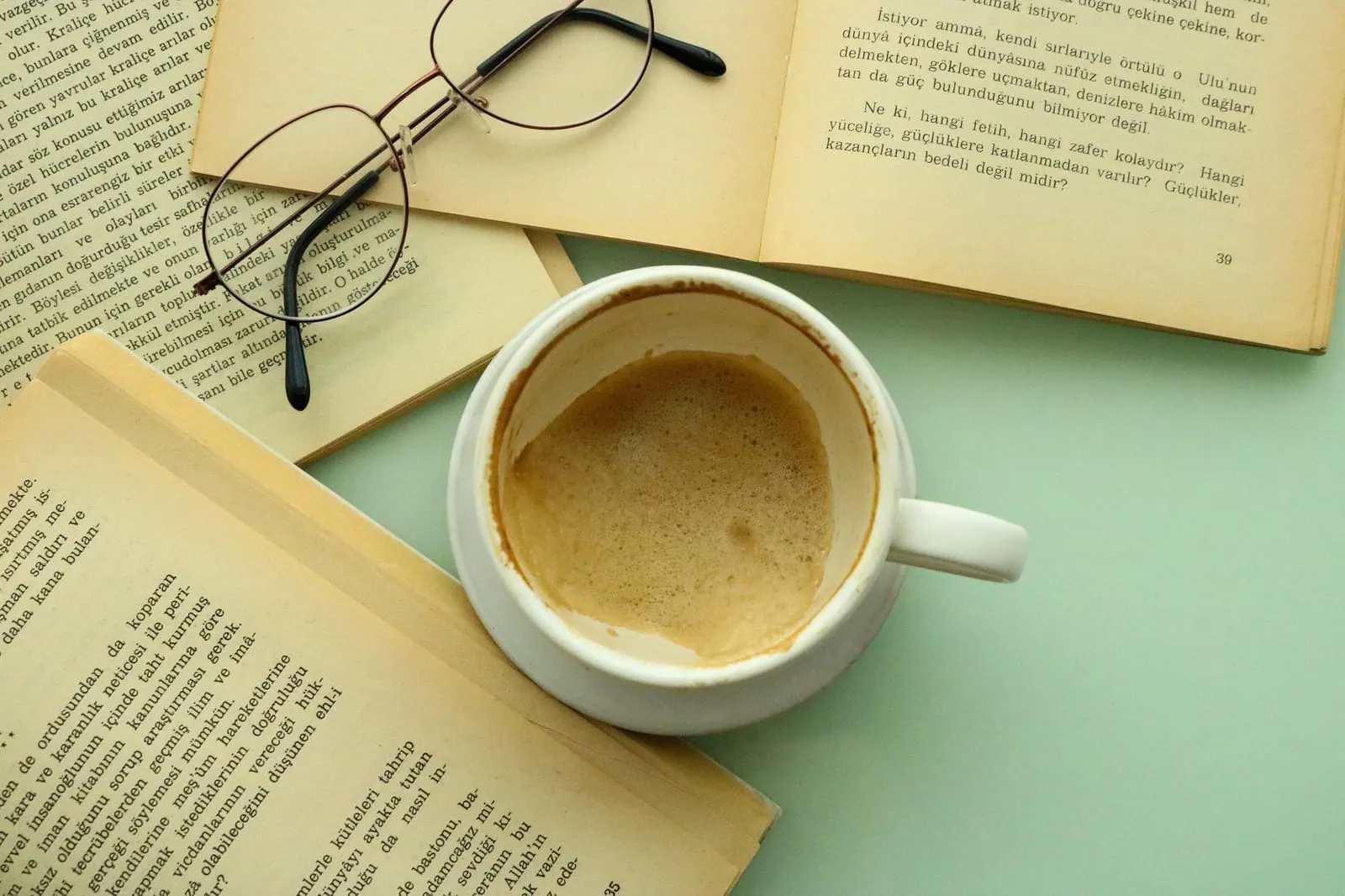 A peaceful café interior with books and soft morning light, symbolizing quiet connection.