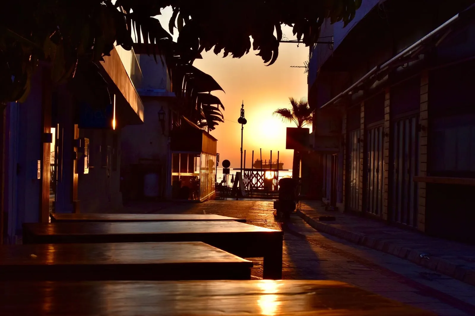 A tranquil city café at sunrise, suggesting new beginnings and quiet reflection.